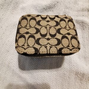 Coach signature pill case